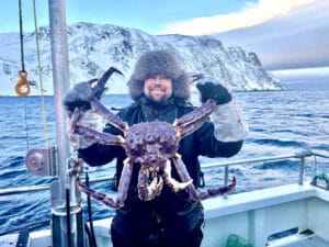 finlande norvege raid motoneige arctique pêche king crab bataeu ocean ciel soleil o-nord