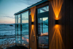 islande panorama glass lodges insolite vue exterieure hiver nature isole voyage luxe o-nord
