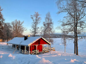 finlande radalla resort extérieur façade nature chalet sauna bois paysage neige charme voyage o-nord