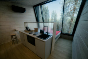 Finlande Laponie Salla Wilderness Lodges Chambre nature intérieur kitchenette cuisine Forêt voyage o-nord