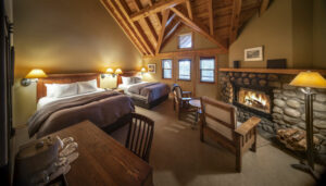 Canada Alberta Banff Buffalo Mountain Lodge chambre Queen 2 lits cheminée fauteuils voyage o-nord