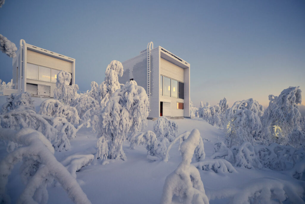 Finlande Laponie Saariselkä Valo Ice Cube villas extérieur neige arbres voyages o-nord