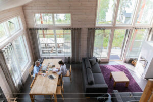 Finlande Oravi Saimaa Lac Foret Tallusniemi Villas Interieur décoration salon canapé cheminée table design luxe charme Nature Voyage O-Nord