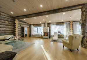 Finlande Laponie Ruka Villa Rinnekaltio Séjour Hébergement Luxe Nature Intérieur Décoration Design Cheminée Salon Bois Hiver Voyage O-Nord