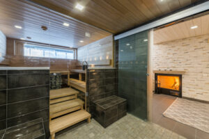 Finlande Laponie Ruka Villa Rinnekaltio Séjour Hébergement Luxe Nature Sauna Intérieur Décoration Design Cheminée Détente Voyage O-Nord